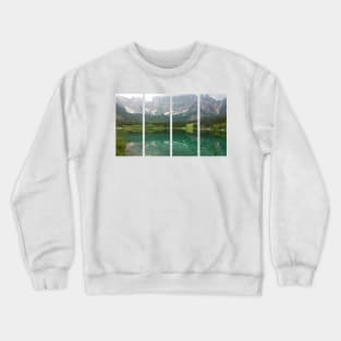 A static shot from the shore of Fusine lake in the Julian Alps with snowy mountains in background. Beautiful nature in a spring cloudy day; no people around Crewneck Sweatshirt